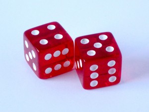 Two red dice, one showing four and the other showing five.